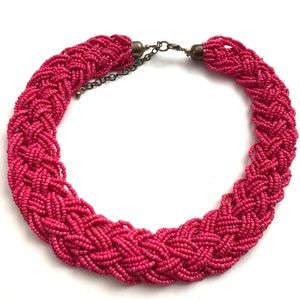 Braided pink bead necklace